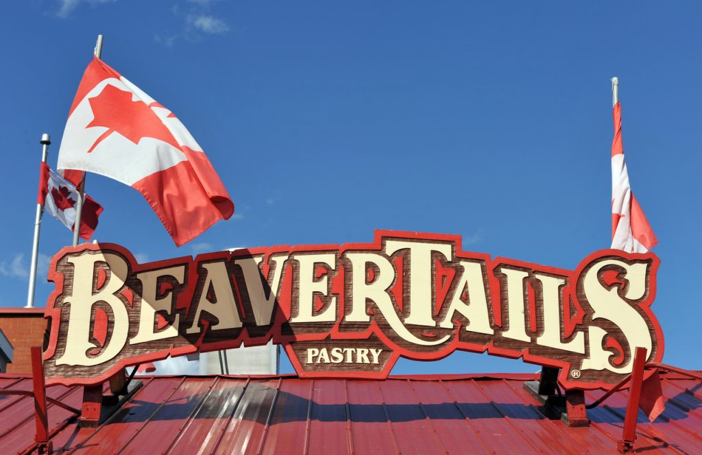 The Ottawa born Canadian Food chain BeaverTails sing with Canadian Flags