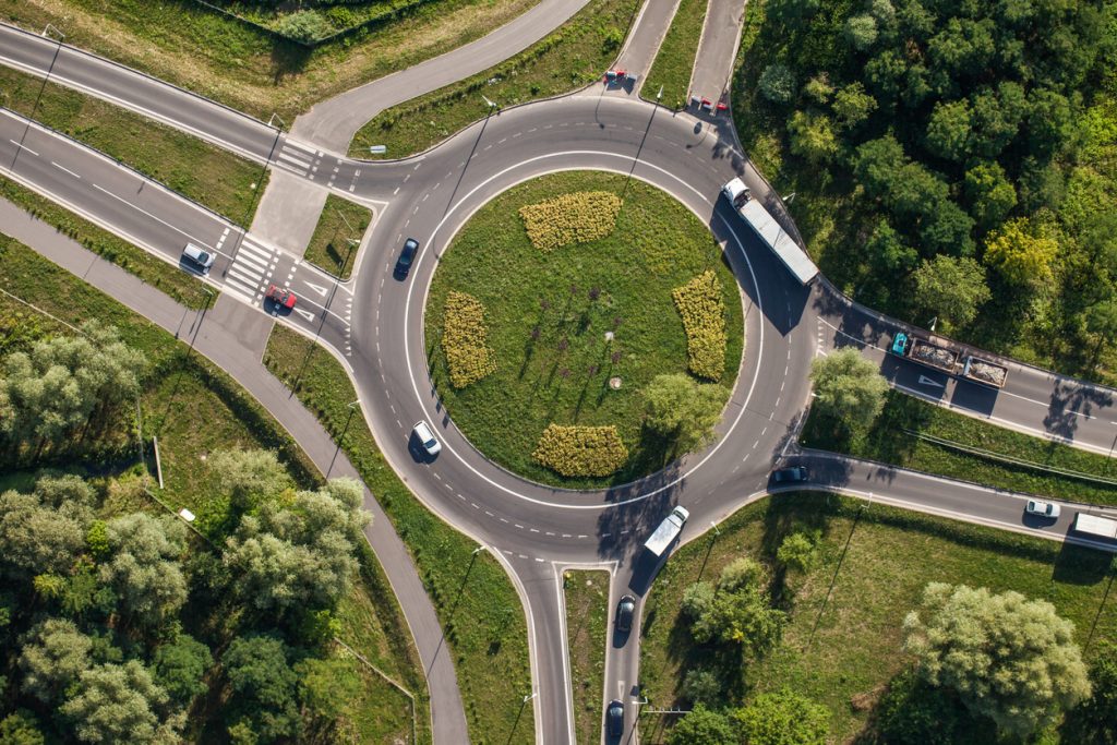 Arial view of cars navigating a roundabout