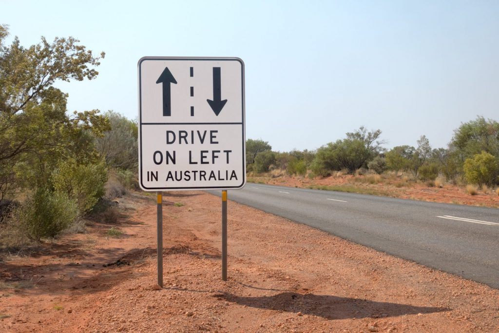Sign reminding people to drive on left in the outback of the Northern Territory in Australia