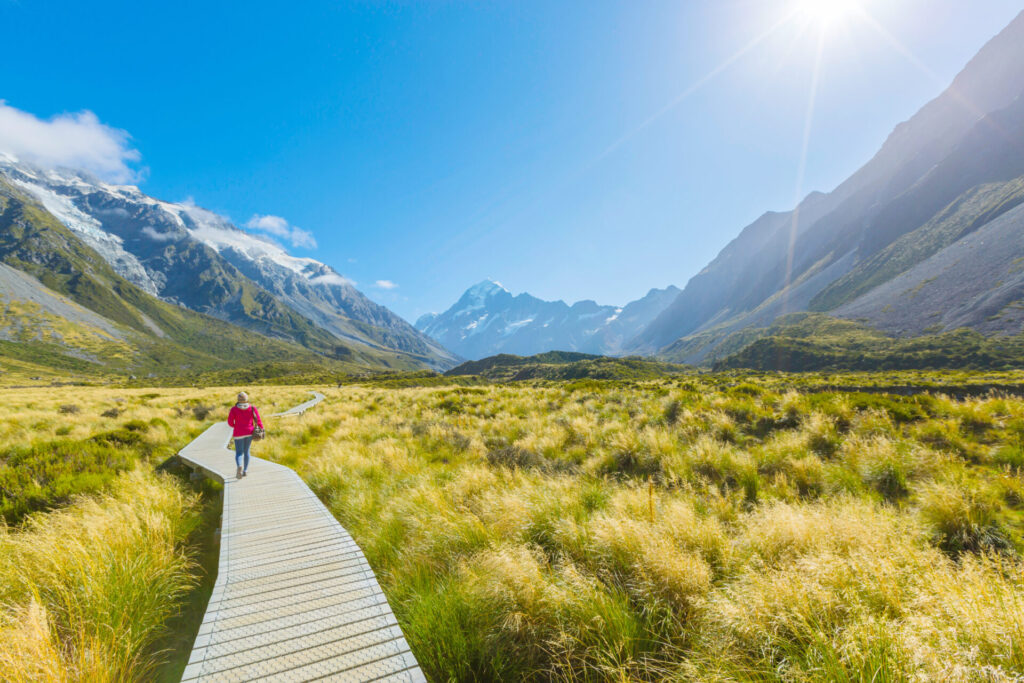 Woman enjoy travel at mount cook national park in south Island New Zealand