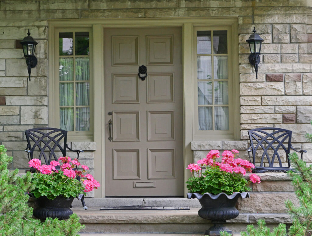 front door of house with flower pot
