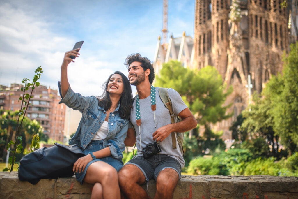 Couple Taking Break from Sightseeing for Selfie