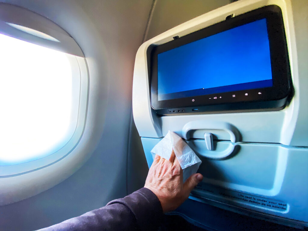 Sanitize airplane tray table