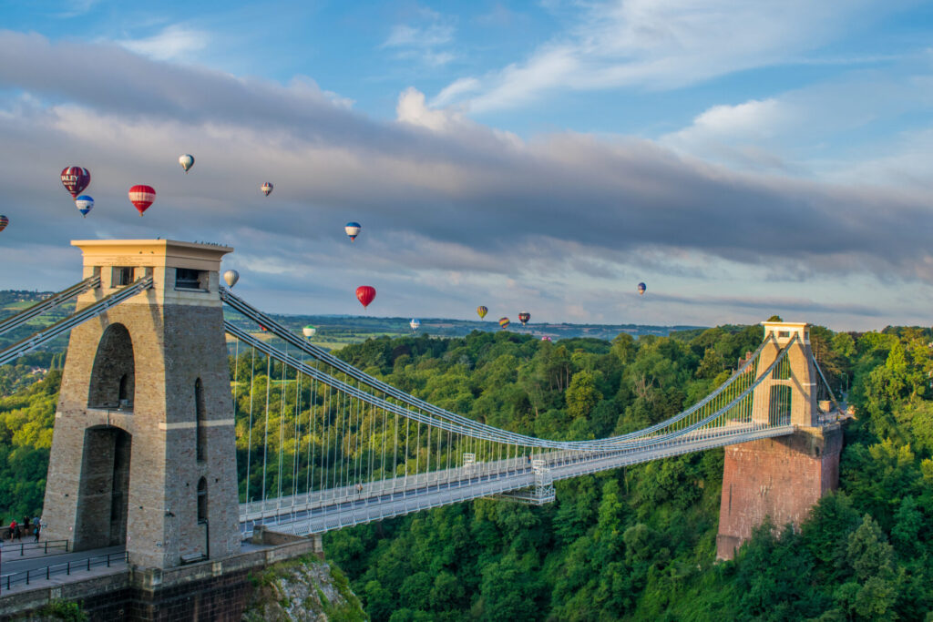 Hot Air Balloons from the Bristol Balloon Fiesta fly past Clifton Suspension Bridge