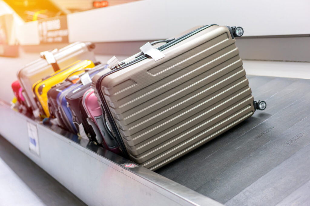 luggage on conveyor belt in the airport