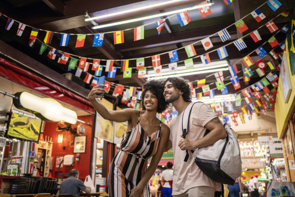 tourist couple making selfie in the municipal market