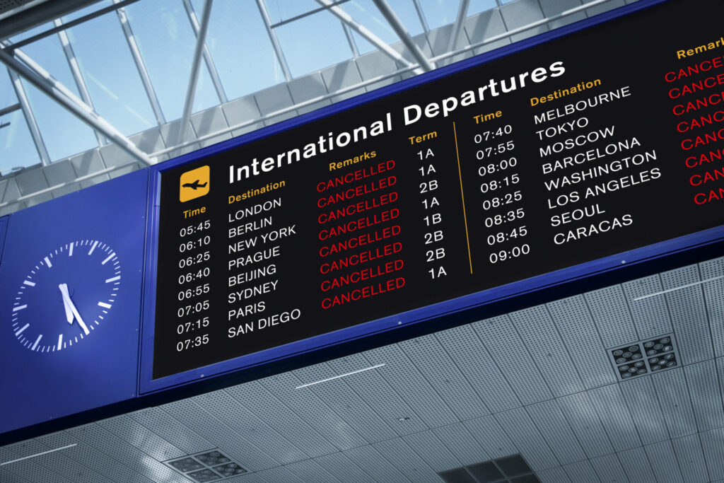 International Departures Information Board with All Flights Cancelled