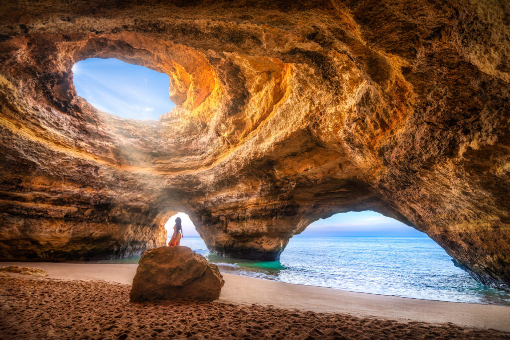 woman in Benagil Cave, Algarve, Portugal