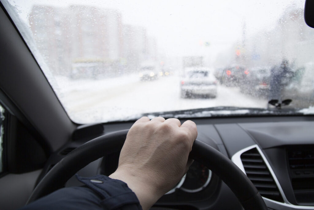 Driving in winter on ice under difficult conditions.