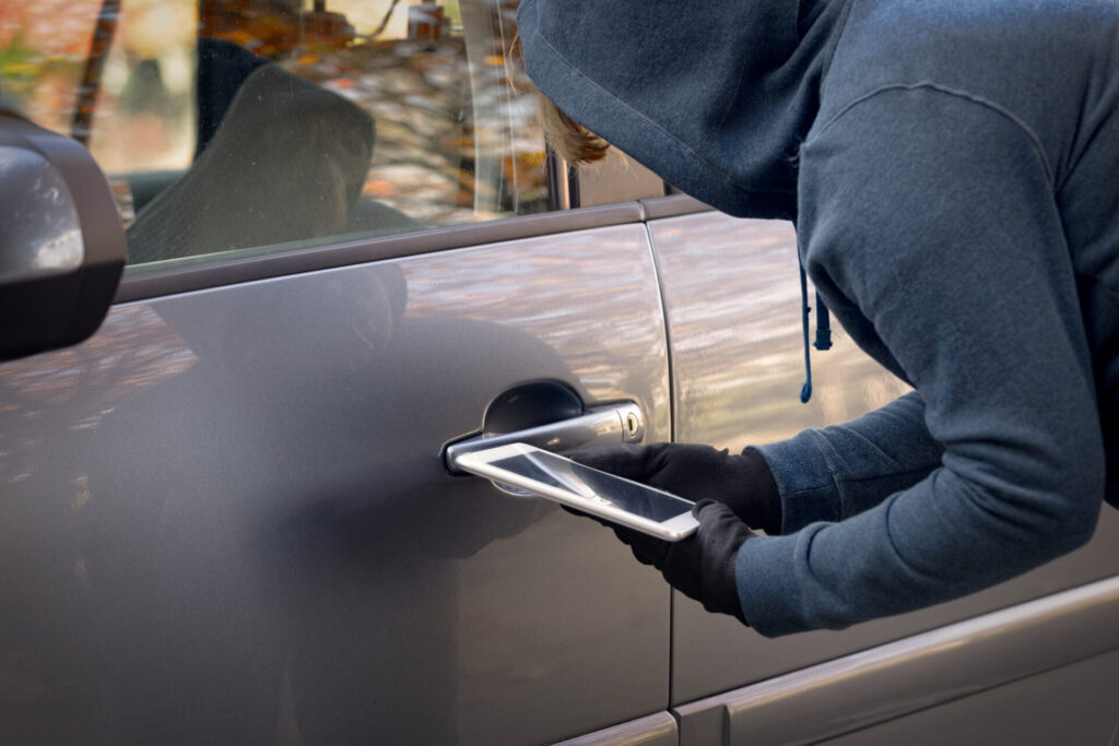 thief tries to break the car's security systems with tablet