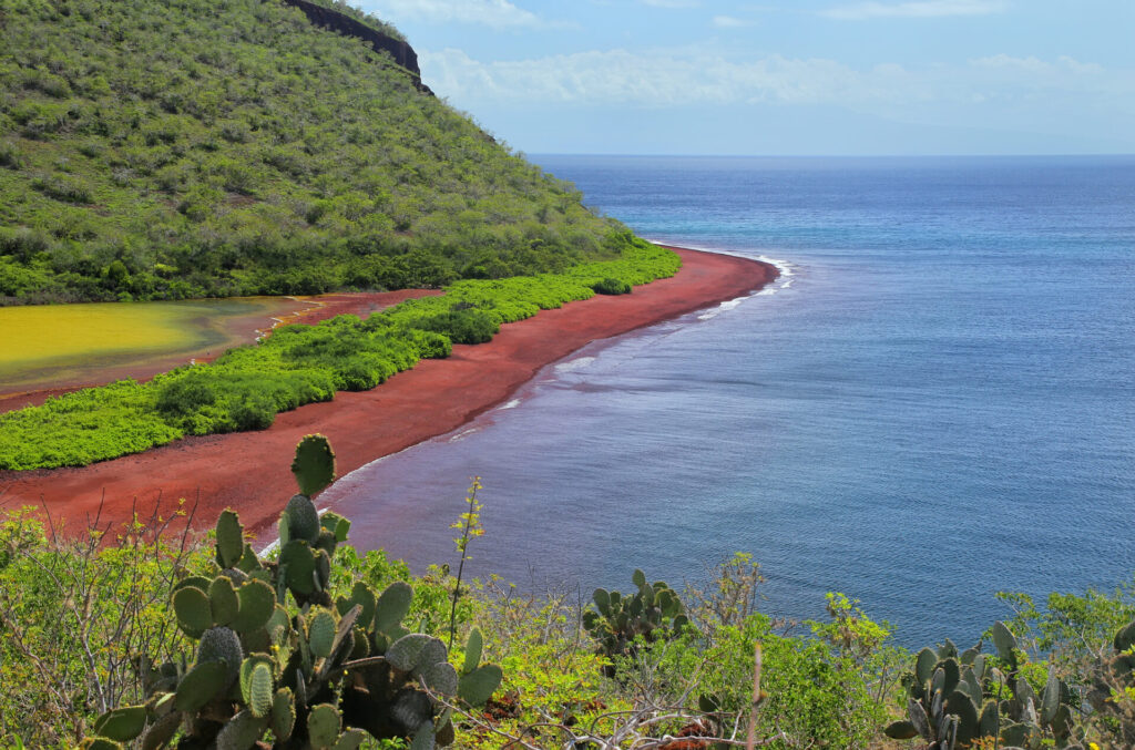 Red beach and lagoon of Rabida Island, Galapagos, Ecuador